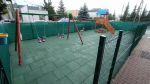 Červená gumová certifikovaná dopadová dlažba FLOMA ProF - délka 50 cm, šířka 50 cm, výška 9 cm