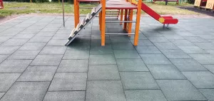 Zelená gumová certifikovaná dopadová dlažba FLOMA ProF - délka 50 cm, šířka 50 cm, výška 7 cm