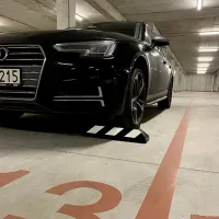 Černo-bílý gumový reflexní parkovací doraz - délka 55 cm, šířka 15 cm, výška 10 cm