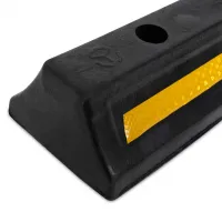 Černo-žlutý gumový parkovací doraz - délka 47 cm, šířka 15 cm, výška 9 cm