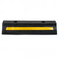 Černo-žlutý gumový parkovací doraz - délka 47 cm, šířka 15 cm, výška 9 cm