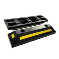 Černo-žlutý gumový parkovací doraz FLOMA WS71 - délka 54 cm, šířka 15 cm, výška 10 cm