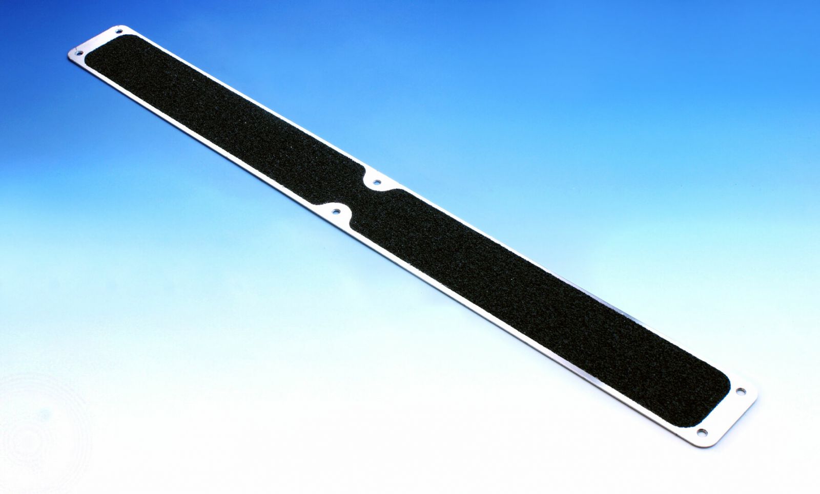 Černá náhradní protiskluzová podlahová páska pro hliníkové nášlapy FLOMA Standard - délka 63,5 cm, šířka 6,3 cm, tloušťka 0,7 mm